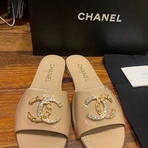 CHANEL Tan Slide Sandals with Gold Chain